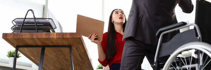 Woman manager surprised from instant cure rose disabled person. Positive effect of experimental...