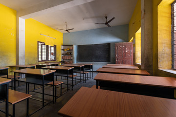 Empty classroom with desks in Indian school - 344413561