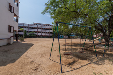 Empty playground at urban school in India - 344413921