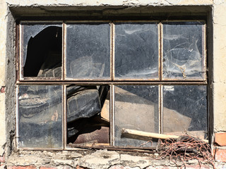 old broken window in the old house
