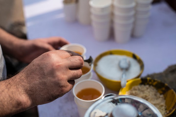 A special tea being prepared in a food stall in a fair. Indian drink and beverages.