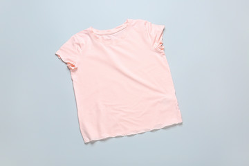 Stylish t-shirt on grey background