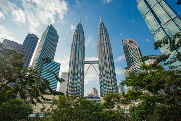 Fototapeta na wymiar Malaysia, Kuala Lumpur,city, building, skyscraper, architecture, skyline, downtown, urban, business, sky, cityscape, buildings, tower, blue, skyscrapers, travel, park, office, landmark, asia, 