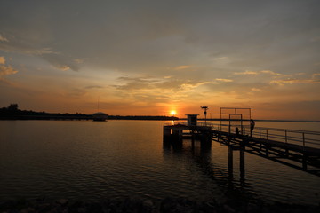 Naklejka na ściany i meble Dokkrai Reservoir and view sunset water reflection at rayong, thailand 