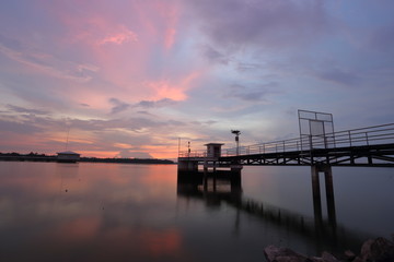 Plakat Dokkrai Reservoir and view sunset water reflection at rayong, thailand 