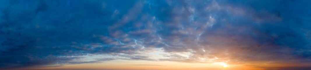 Naklejka na ściany i meble Panorama sunrise sky and cloud at morning background image . Panorama sky and cloud.