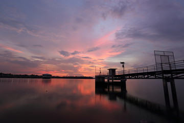 Obraz na płótnie Canvas Dokkrai Reservoir and view sunset water reflection at rayong, thailand 