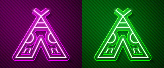Glowing neon line Traditional indian teepee or wigwam icon isolated on purple and green background. Indian tent. Vector Illustration © Kostiantyn