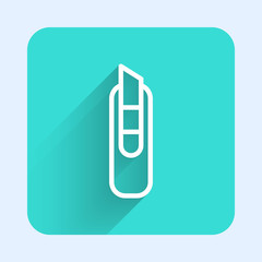 White line Stationery knife icon isolated with long shadow. Office paper cutter. Green square button. Vector Illustration