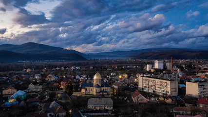 panorama of the city Mukatchevo in rain clouds