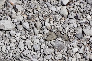 white pebble on the floor . stones texture .