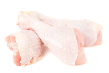 Raw chicken legs isolated on white background