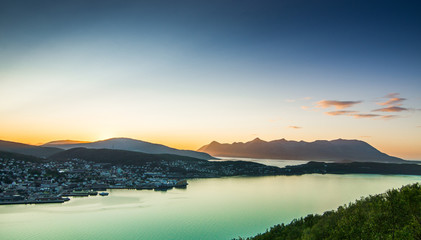 colorful sunset in norway during summer with clouds