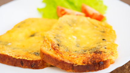 sandwiches baked with cheese with Salad and tomato on the plate