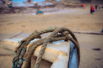 A close up of a boat and its tow rope