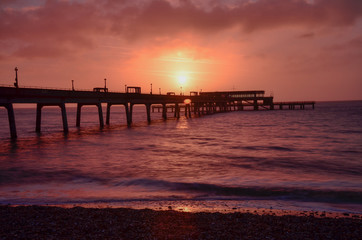 Fototapeta na wymiar Sunrise Over Deal Pier