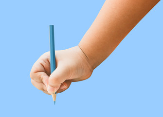 Children hand holding a blue pencil on a isolated background.