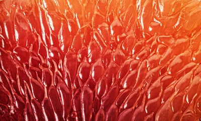Fotobehang Grapefruit segment achtergrond. Textuur van verse grapefruit close-up. Abstracte macro schieten. © Tryfonov