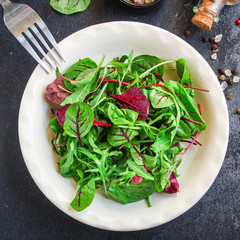 Healthy salad, leaves mix salad (mix micro greens, juicy snack) keto or paleo menu recipe. food background, copy space for text