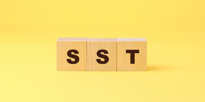 sst sales and service tax abbreviation word on wooden blocks business taxation concept