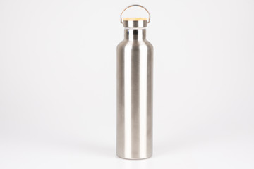 Reusable eco-friendly silver stainless steel grey thermo bottles on white background