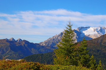 Beautiful summer landscape, fantastic alpine pass and high mountains, Dolomites, Italy, Europe. Selective focus.