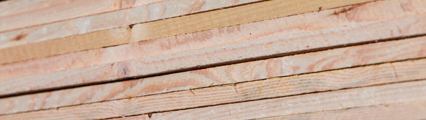 Warehouse with products of woodworking boards and timber