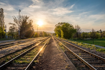 Spring sunset on railway tracks