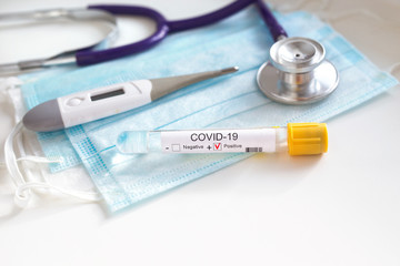Coronavirus test and protective mask,stethoscope on white background