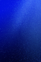 Blue gradient background with dust, rays and highlights.
