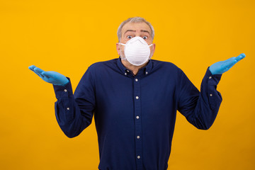 adult or senior man with mask and gloves isolated on background