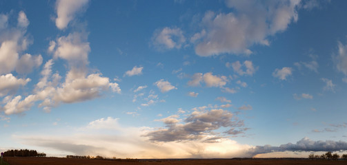 Obraz premium dark clouds red sun at sunset day