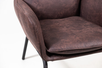 leather armchair with metal legs on white background