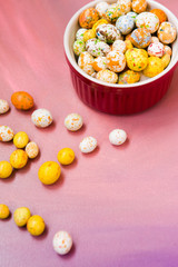 multicolored candy jelly beans caramel in the shape of small Easter eggs