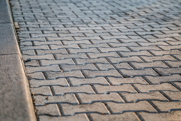 Perspective View Monotone Gray Brick Stone Pavement on The Ground for Street Road. Sidewalk,...