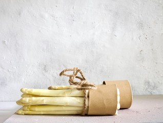 Fresh white asparagus in bunches with copy space