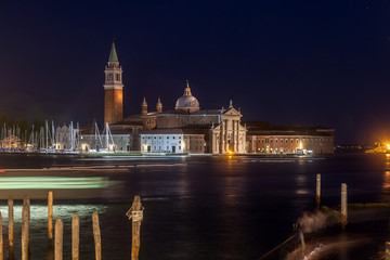 Naklejka premium Gondolas, Grand Canal and San Giorgio Maggiore Church at night, Venice