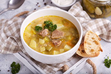 Traditional Russian soup Rassolnik with beef meat and pickled cucumbers