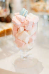 Fototapeta na wymiar Vase with pink marshmallows