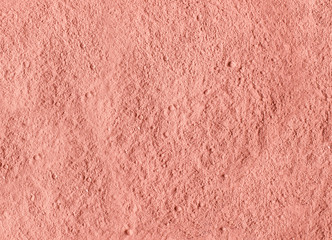 Pink bentonite clay powder texture close up. Diy facial mask and body wrap recipe. Natural beauty...