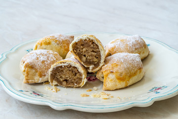 Traditional Acem Cookies with Powder / Powdered Sugar, Walnut Paste and Grated Orange.