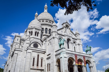 View of the famous Sacre Coeur Cathedral during summer time in Paris, France