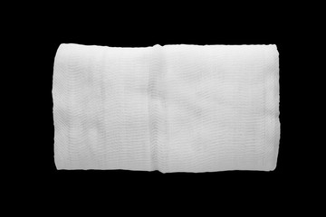 roll of medical gauze on a black background. Isolate.