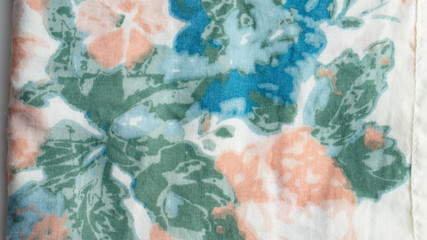 Abstract floral fabric texture, photographed in natural light.
