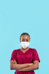 Female black doctor having her arms crossed