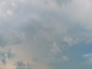 black and white clouds with blue sky