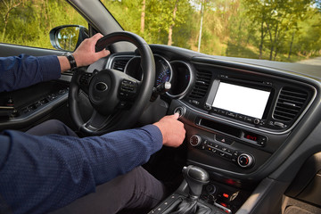 Car driver starting the engine Start, stop engine button