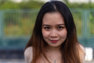 Fototapeta premium A Vietnamese woman with black hair in Vietnam 