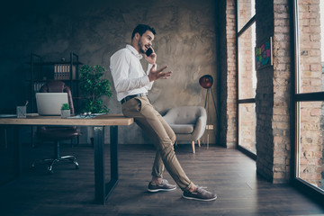 Profile side full length body size view of nice attractive cheerful man ceo boss chief calling...