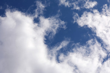 Blue sky background with clouds. Clearing day and Good weather. selective focus